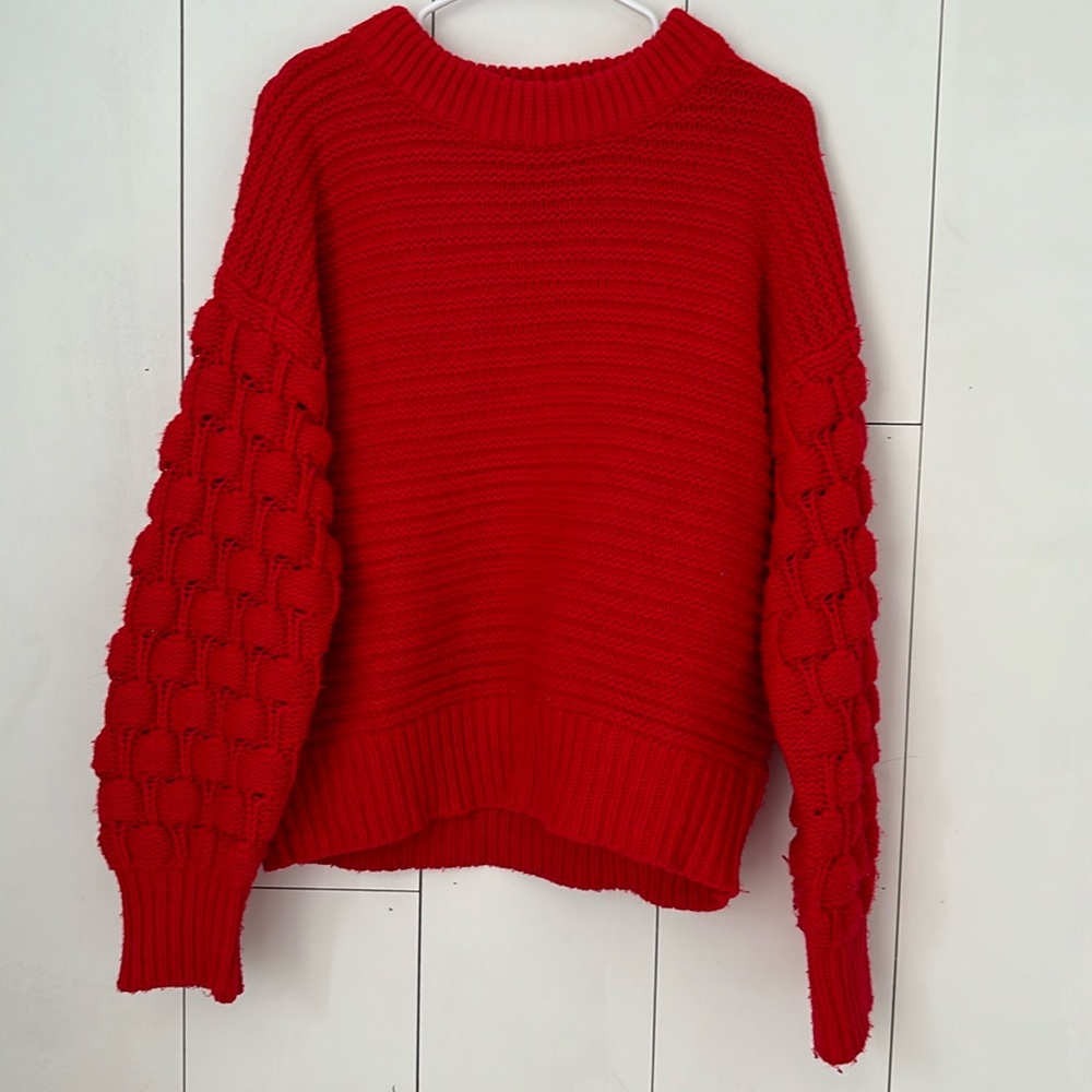 Large red knit sweater